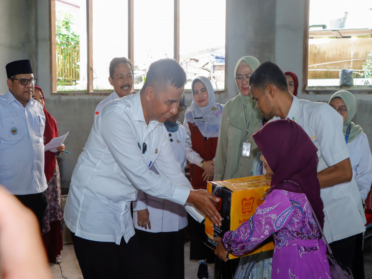 Bupati Kampar Terima Bantuan Penyandang Disabilitas dari ATENSI Handayani Jakarta