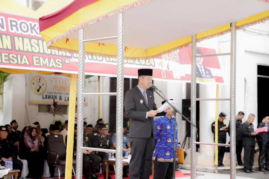 Jadi Inspektur Upacara Harkitnas, Bupati Rohil Sampaikan Amanat Menteri Kominfo RI