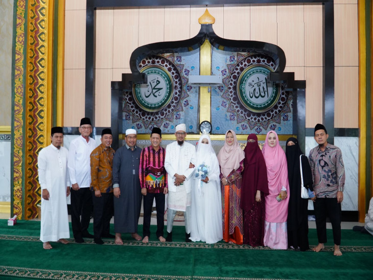 Bersama Dr Irjen Pol (Pur) Mulyono Sulaiman, Pj Bupati Kampar Jadi Saksi Ijab Kabul Juan dan Nahdhia