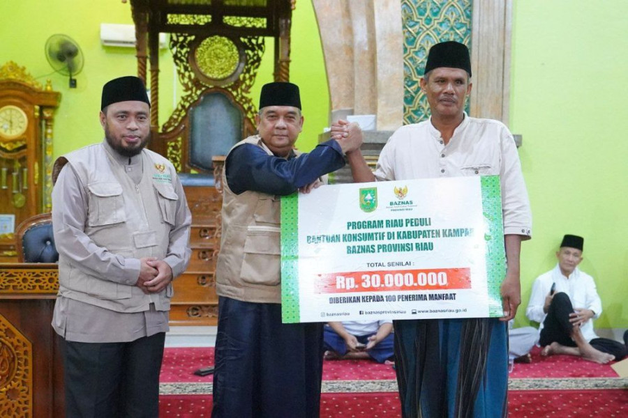 BAZNAS Provinsi Riau Serahkan Bantuan untuk Mustahik di Desa Rimbo Panjang