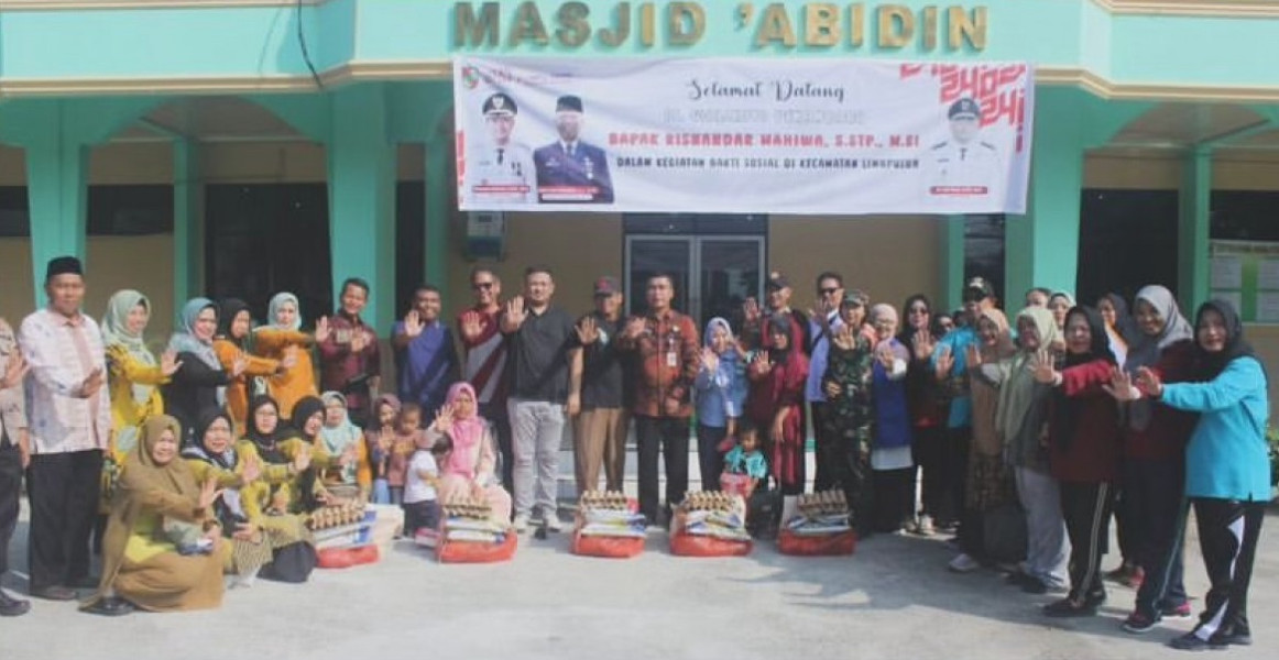 Kepala Disdalduk KB Pekanbaru Salurkan Bantuan Progtam BAAS Untuk Anak Stunting di Limapuluh